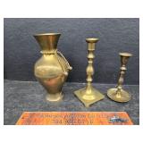 Brass candle stands and vase