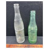 2 vintage drink bottles
