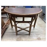 Rattan half round table