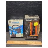 Earbuds and a flashlight