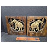 Carved wood elephant wall hangings