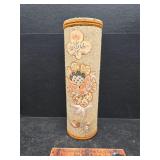 Folk art garbage can