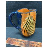 Pottery pitcher