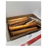 Antique wooden spools and wall brushes