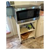 Microwave, cabinet and contents