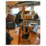 Fender Squier jazz bass guitar with case and books