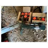 Skeet thrower and skeetï¿½s