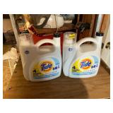 2 jugs of laundry detergent