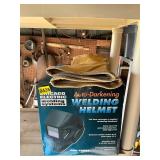 Welding helmet and gloves