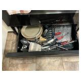 Drawer ,cabinet a drawer of stove contents