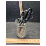 Old scissors in a jar