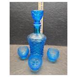 Blue glass decanter and other