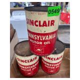 3- full Sinclair oil cans