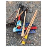 Lot of yard tools rake handles, pushbrooms