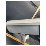 Spinach, aluminum mailbox