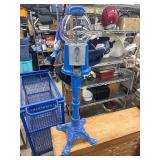 Gumball machine on metal stand