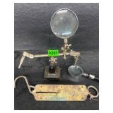 Vintage fly, tying vice and scales