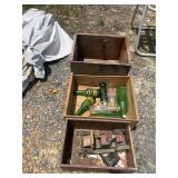 Vintage wooden advertising boxes and bottles