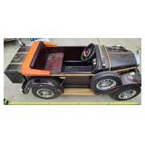 Wood car built around a powerwheels