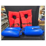 Boat fenders, life vests and a tote