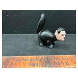 Cast iron skunk