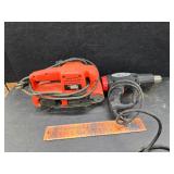 Sander and heat gun working
