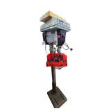 Drill press with bits