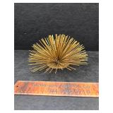 Metal starburst wall hanging