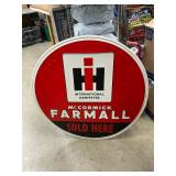 Large metal Farmall sign