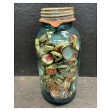 #13 blue jar with bottle caps