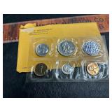 1958 mint set quarter,half and dime are sliver