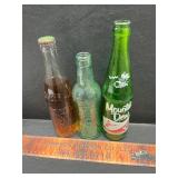 3 vintage bottles