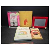 Books and an etch a Sketch