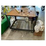 Metal frame table on wheels 30ï¿½ by 40ï¿½