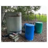 Oil drum ,6 barrels and drain pipe