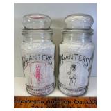 2 embossed planters jars