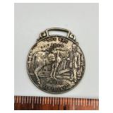 Early 1900s green River whiskey watch fob