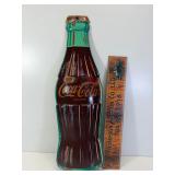 Early tin die cut coke bottle sign