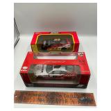 2 die cast race cars