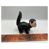 Cast iron skunk