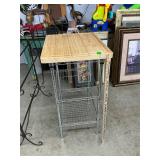 Metal shelf with cutting board top