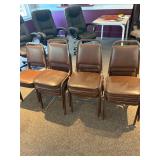 11 stacking chairs ï¿½ black frame, brown padding