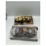2 die cast race cars