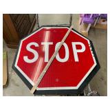 Metal stop sign with black metal background