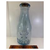 Large glass milk bottle