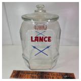 8 Sided Lance Jar. Chip in lid and rim of jar.