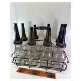 Antique oil bottles and holder