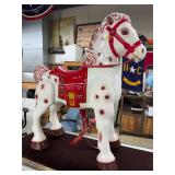 Antique restored Mobo Bronco metal riding horse