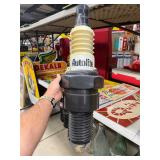 Plastic vintage auto lite spark plug sign