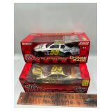 2 die cast race cars